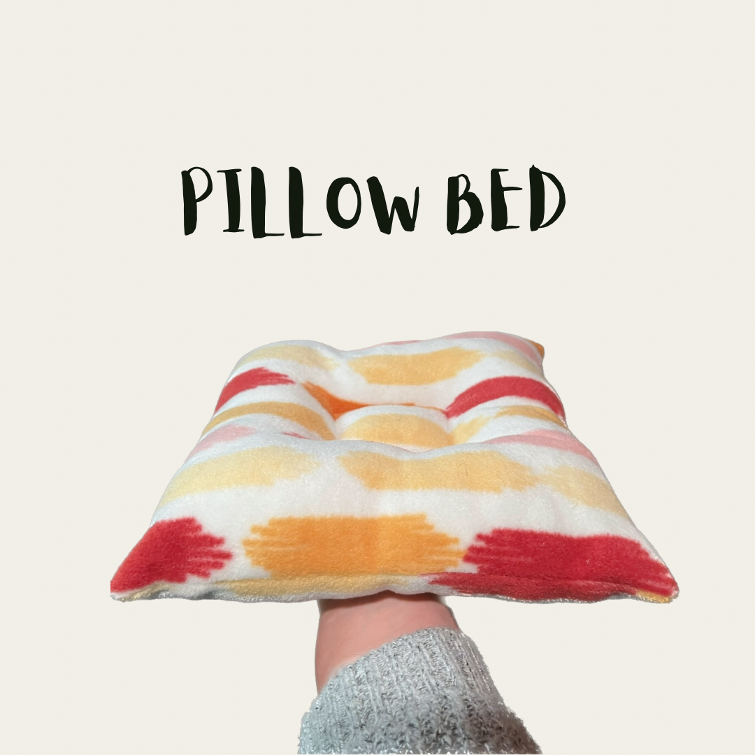 Cama con almohadas